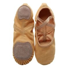 a pair of baby shoes with ruffles on the bottom and soles in tan