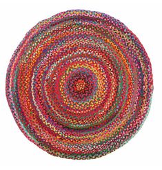 a multicolored round rug on a white background