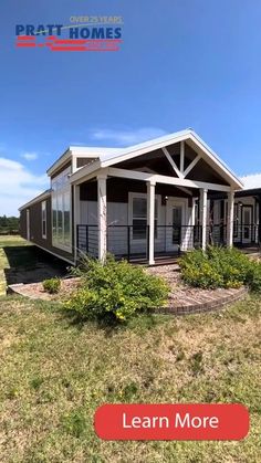 a mobile home with the words learn more on it's front porch and back porch