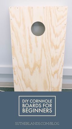 the diy cornhole boards for beginners are made from wood and have holes in them