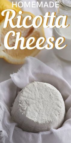 homemade ricotta cheese in a bowl with lemons