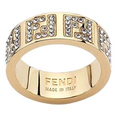 Elevate Your Style With The Iconic F Is Fendi Wide Band Crystal Ring, Featuring Engraved Letters On Gold-Finish Metal. This Classic Ring Includes Engraved Decoration In The F Is Fendi Shape And Decorated With Natural Crystals. Fashion-Forward And Elegant, This Ring Makes The Perfect Finish For Any Outfit. Gift This Gorgeous Ring Or Add It To Your Personal Designer Collection, Only From Fendi. Model: 8ah399 Size: Small (Us Size 5.5) Gold-Finished Metal Ring With Engraved With Ff Logo Decorated Wi Crystals Fashion, Engraved Letters, Fendi Jewelry, Ff Logo, Gorgeous Ring, Crystal Ring, Metal Ring, Classic Ring, Sparkling Crystal