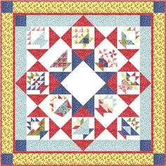 a red, white and blue quilt on display