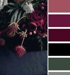 a bouquet of flowers sitting on top of a table next to a color swatch