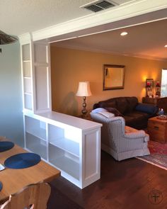 the living room is clean and ready to be used as a den or family room