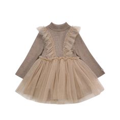 The adorable Flovos dress pairs style and versatility effortlessly. The wool- blend turtleneck bodice keeps your little one warm, while the tulle skirt and details create an irresistibly charming silhouette. This slip- on dress is the perfect choice for any family festivity, a theatre visit or a birthday celebration. Winter Beige Turtleneck Dress, Beige Turtleneck Dress For Winter, Beige Turtleneck Winter Dress, Winter Party Dress With Tulle Skirt, Long Sleeve Tulle Tutu Dress With Ruffles, Winter Tulle Dress With Ruffles, Winter Fitted Tutu Dress With Ruffles, Spring Long Sleeve Tutu Dress With Tulle Skirt, Winter Dress-up Ruffle Dress