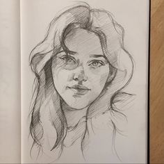 a pencil drawing of a woman's face