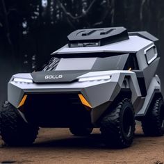 a futuristic vehicle is parked on the dirt