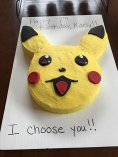 a birthday cake made to look like a pikachu