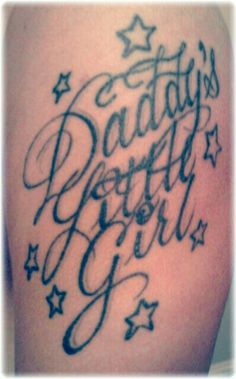 a tattoo with the words daddy's pretty girl written in cursive writing