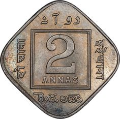 an old coin with the number two on it