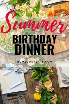 a wooden table topped with plates covered in flowers and greenery next to the words summer birthday dinner