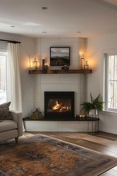 a living room filled with furniture and a fire place