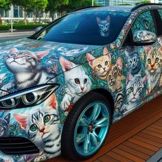 a car with cats painted on it is parked in front of a wooden flooring area