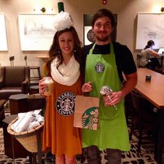 a man and woman dressed up in starbucks costumes