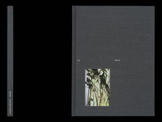 the book is open and showing an image of some plants on it's cover