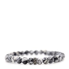 This unique bracelet features rare Pinolith from Sweden, its soft grey and white marbled pattern unlike any other stone. At the center, a sterling silver double row black diamond rondelle adds a bold contrast. Known for promoting peace and clarity, Pinolith makes this bracelet as powerful as it is beautiful.  Gemstones in their natural form are imperfect as such, no two stones are alike which add to the character and the beauty of the stone.  One-of-a-kind. Made in Canada. We passionately believe in sourcing and using the best quality gemstones for our collections. In our opinion, a little bit of wear and tear is a sign that your jewellery is loved and has been enjoyed! However, we appreciate that you will want to protect your special piece and keep it looking good for as long as possible. Canadian Jewelry, Beautiful Gemstones, September Birthstone Jewelry, Natural Form, Forever Jewelry, Unique Bracelets, Men's Jewelry Rings, Jewelry Ring Box, Black Diamonds