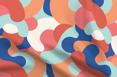 an abstract background with circles and shapes in blue, pink, orange, and white