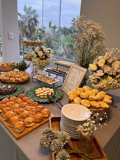 an assortment of pastries and desserts on a table