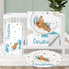 a baby crib bedding set with a teddy bear on the moon and personalized name