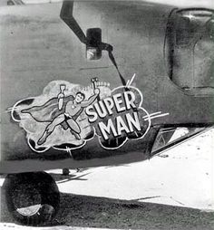 an old airplane with the words super man painted on it