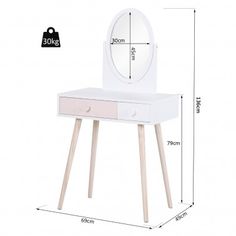 a white vanity table with a mirror on top and wooden legs in front of it