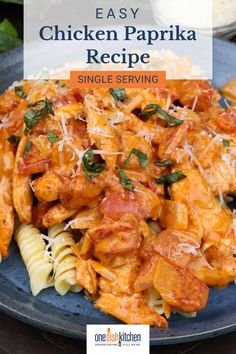 easy chicken paprika recipe on a plate with pasta and parmesan cheese