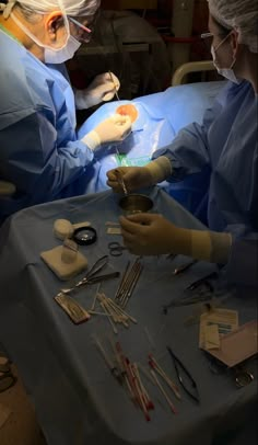 two doctors performing surgery in an operating room