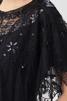 Material: high quality polyester, sequins, beads, fringe and embroidery decoration. One size fits most. Design: see-through evening shawl; sequin beaded flowers; embroidery pattern; pullover design; beaded fringe. This chiffon and exquisite wrap with blinking decorative beaded sequins can match perfectly with your 1920s flapper outfit, charming with any other types of dresses, sweater, shirts, etc. Stylish outfit for daily wear, also can be wore as a vintage 1920s flapper outfit for a special ev Glamorous Party Shawl, Elegant Sequin Party Shawl, Elegant Embellished Sequin Fabric For Celebration, Festive Evening Embroidered Sequin Fabric, Festive Party Shawl With Sequins, Festive Embellished Sequin Fabric For Parties, Elegant Evening Shawl With Sequins, Elegant Evening Sequin Fabric With Intricate Embroidery, Festive Evening Embroidered Shawl