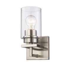 a wall light with a clear glass shade on the front and back of it's arm