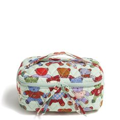 the small cosmetic bag is decorated with teddy bears