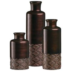 three brown vases sitting next to each other