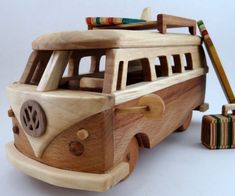 a wooden model of a vw camper van