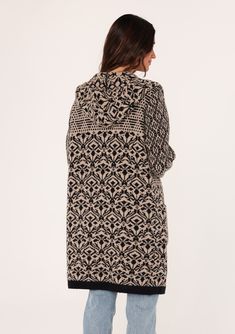 A soft bohemian sweater coat with a warm hood and side pockets. Designed in a taupe brown and black jacquard knit. Jacquard Relaxed fit Long sleeves Mid-length Hoodie Open front Side pockets Contrast ribbed trim Fall bohemian cardigan An instant classic, our warm and cozy sweater coat features a versatile mid-length hemline, an easy open front, and essential side pockets. The ultra-boho jacquard design pairs effortlessly with denim. Model is 5'9, wearing a size S. Style: I-51047K-SNE Cozy Jacquard Knit Outerwear For Cold Weather, Cozy Winter Jacquard Knit Sweater Coat, Cozy Jacquard Knit Sweater Coat For Winter, Cozy Jacquard Knit Winter Outerwear, Black Outerwear With Fair Isle Pattern For Fall, Beige Jacquard Knit Long Sleeve Outerwear, Black Fair Isle Pattern Outerwear For Fall, Bohemian Jacquard Knit Outerwear For Fall, Cozy Black Outerwear With Fair Isle Pattern