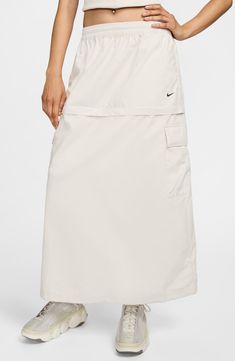 Strut your sporty style across all seasons with this pocket-packed cargo skirt that converts from maxi to mini with an easy zip-off panel. Elastic/drawstring waist Side-seam pockets; cargo flap-patch pockets 52% polyester, 48% cotton Machine wash, dry flat Imported Nike Court Borough Mid 2, Cargo Midi Skirt, Court Borough Mid 2, Mini A, Style Finder, Midi Dress Party, Cargo Skirt, Women Lifestyle, Cold Hands