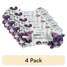 four pack of purple and white mop head cleaning cloths with the words bernat all over it