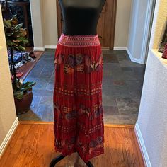 This Is An Incredible Red Skirt With Beautiful Butterfly’s In Purple, Pinks & Golds. Lined To Knees. Red Lace At Bottom And Inserted At 4 Places Coming Down Skirt. Size Small. Nwt Casual Red Long Skirt, Red Maxi Skirt With Elastic Waistband, Red Pleated Flowy Maxi Skirt, Red Midi Skirt With Elastic Waistband, Red Tiered Maxi Skirt With Elastic Waistband, Red Skirt With Elastic Waistband, Red Flowy Flared Skirt, Red Fitted Skirt With Elastic Waistband, Bohemian Red Flared Skirt Bottoms