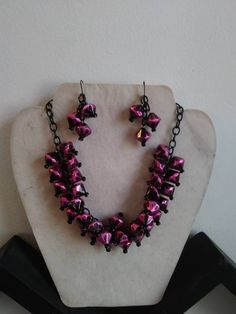 I have always loved novelty vintage jewelry ! This is my version , made by me of the statement jewelry that was so poplular in the late 40s early 50s & the colors are perfect compliment 😊 Fuschia pink and black faceted lucite beads in double rows with black aluminum chain that is 20 inches long. Matching earrings are pierced Handmade Dangle Jewelry Sets For Party, Handmade Costume Jewelry Earrings For Party, Purple Vintage Jewelry For Party, Vintage Dangle Jewelry For Party, Retro Beaded Jewelry For Evening, Retro Beaded Evening Jewelry, Vintage Beaded Jewelry For Party, Black Retro Handmade Jewelry, Retro Black Handmade Jewelry