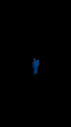 two blue figures are seen in the dark