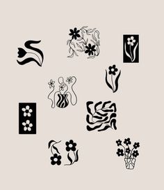 some black and white designs on a gray background, with flowers in vases next to them