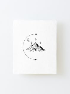 a black and white drawing of mountains with stars in the sky on top of it