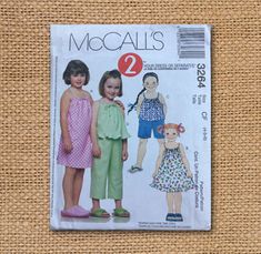 Two hour easy sewing pattern from McCalls 3264, collection of child's separates including a dress, blouse and pants, and shorts.  Includes pattern and instructions. All sales final on patterns. Bib Snow Pants, Kids Clothes Patterns, Shorts Pattern, Clothes Pattern, Pattern Sewing, Sewing Patterns For Kids, Mccalls Sewing Patterns, Childrens Dress, Easy Sewing Patterns