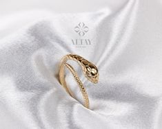 ABOUT PRODUCT This 14k Gold Snake Ring is suitable gift for girlfriend, mom and her. You can even buy as a birthday gift for your friends or anniversary gifts, If you want to add a special note we can write for you and put to inside of package. We manufacture our jewelry pieces with carefully and after production we double checking in quality control department. Our main idea is keep our items for daily wearing especially for minimalist jewelry pieces. Cute Snake animal ring. Great design tiny g White Gold Snake Ring As A Gift, White Gold Snake Ring Fine Jewelry For Gift, Luxury Adjustable Snake Ring For Gift, Luxury Adjustable Snake Ring Gift, Fine Jewelry Snake-shaped Rings For Gifts, Adjustable Snake Ring Fine Jewelry For Gift, Silver Snake Ring In 14k Gold As Gift, Silver 14k Gold Snake Ring Gift, Elegant Snake Shape Ring As Gift