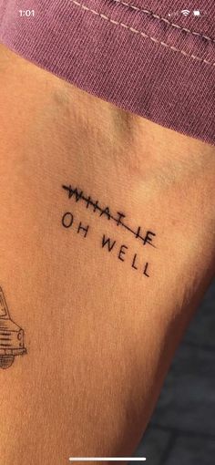 a person with a tattoo on their arm that says,'whale oh well '