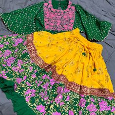 Very Beautiful Gharga Choli. Lehenga. Never Worn. Traditional Frocks For Kids, Traditional Green Choli For Spring, Traditional Yellow Summer Sets, Festive Yellow Set With Ruffles, Festive Yellow Ruffled Set, Traditional Yellow Sets With Ruffles, Traditional Yellow Ruffled Sets, Yellow Festive Choli For Summer, Traditional Yellow Summer Choli