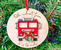 an ornament hanging from a christmas tree that says oh what fun it is to ride