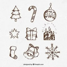 hand drawn christmas icons on white paper