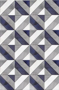 an abstract tile design in blue and white