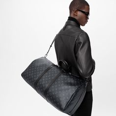 LOUIS VUITTON MONOGRAM ECLIPSE KEEPALL Bandoulière 55 BAG-LIKE NEW CONDITION LOUIS VUITTON Keepall 55 Bandoulière in new iconic black and grey Monogram Eclipse canvas. Light, supple and always ready for immediate departure, the bag lives up to its name: those adept at the art of packing can easily fit a week's wardrobe into the generously sized (and cabin-friendly) Keepall 55. FEATURES: Coated Canvas Natural Cowhide Leather trimmings Cotton Textile Lining Silver brass pieces Double zip closure Removable leather ID holder Padlock Cabin size Strap:Removable, adjustable Strap drop: 14.2 inches Strap drop max: 19.7 inches Handle:Double 21.7 x 12.2 x 10.2 inches MADE IN ITALY CONDITION: LIKE NEW, FEEL FREE TO REQUEST ADDITIONAL IMAGES This Louis Vuitton® Louis Vuitton is a registered trademark Weekend Duffle Bag, Louis Vuitton Keepall 55, Louis Vuitton Keepall, Cotton Textile, Louis Vuitton Official, Boutique Jewelry, Small Leather Goods, Cowhide Leather, Leather Backpack