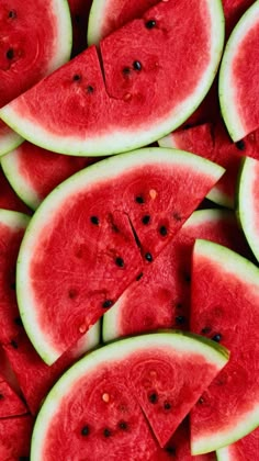 slices of watermelon are arranged on top of each other